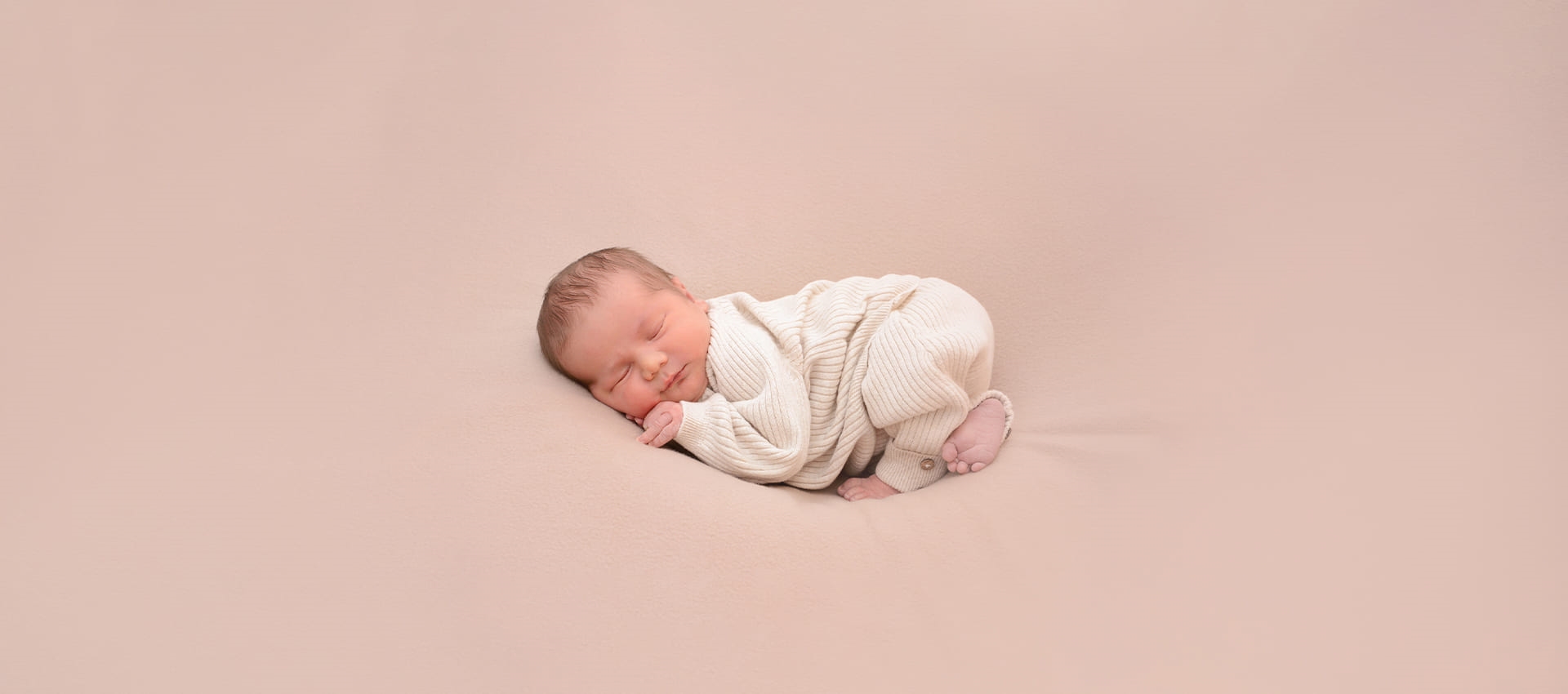 Liebevolle Babyfotografie